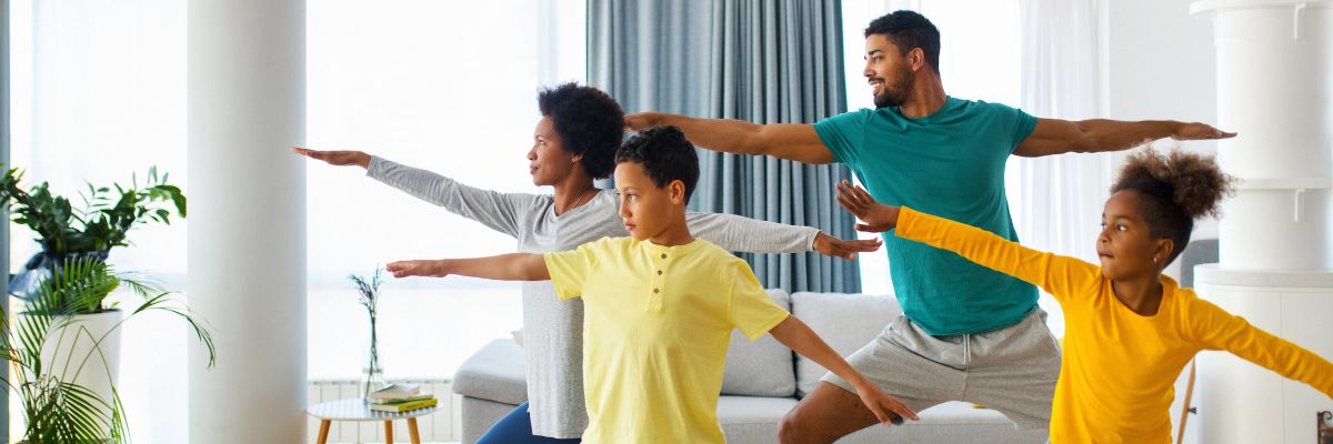 family doing yoga